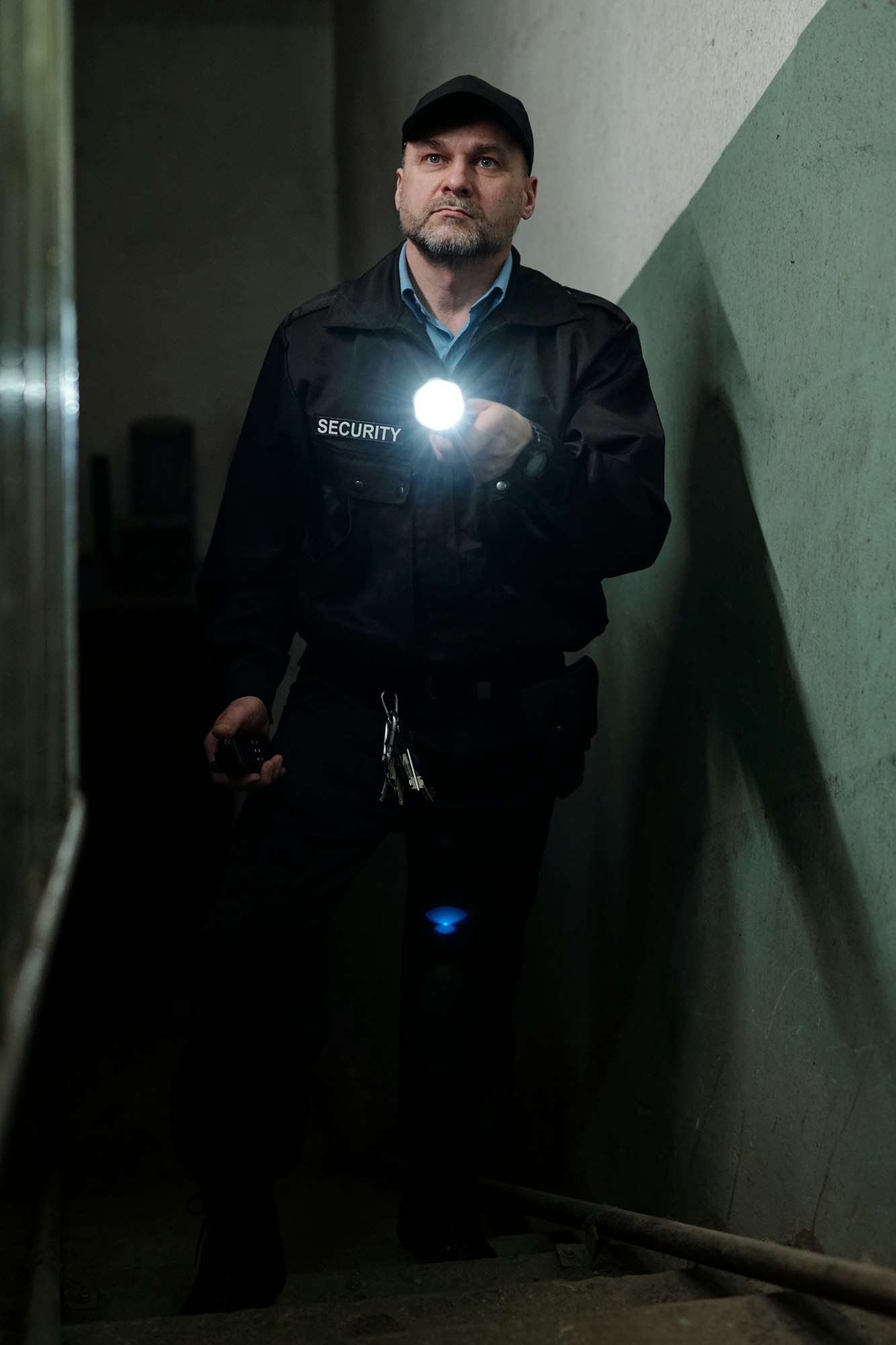 Security guard with flashlight
